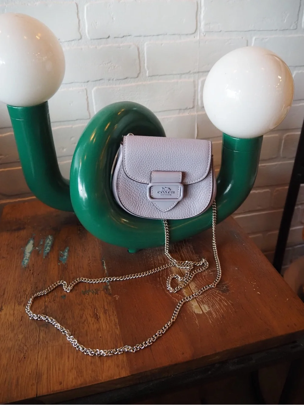 Coach compact pebble